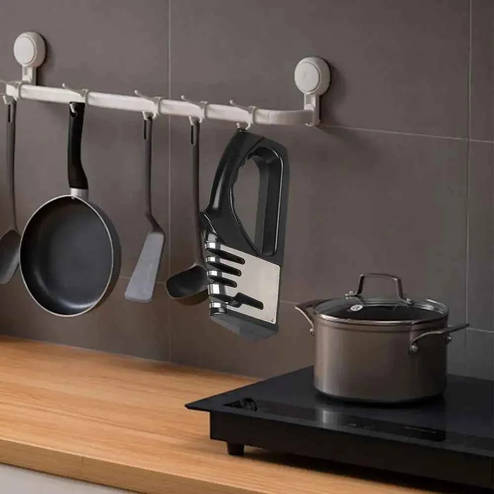 My Store 4 segment knife sharpener hanging beside cooking utensils in a modern kitchen setting