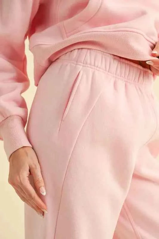 Aemi+Co elastic waist joggers in soft pink fabric with side pockets for comfort and style