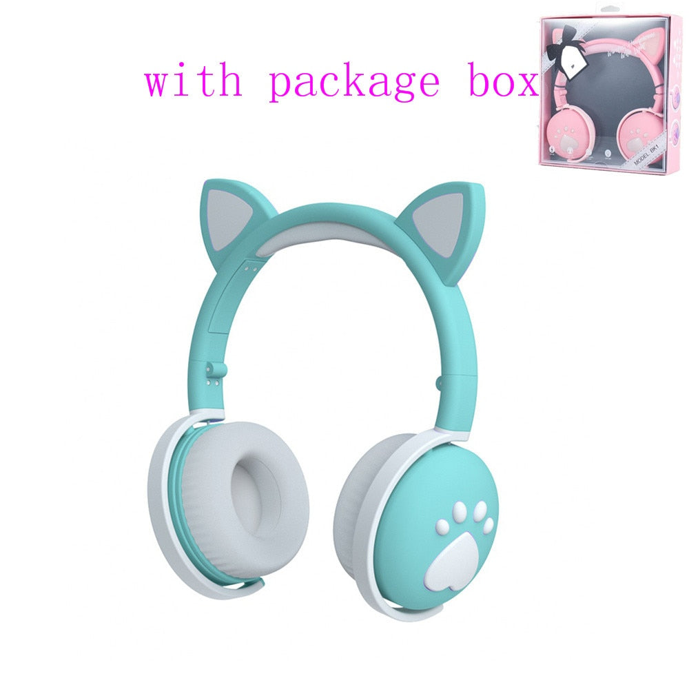 Bluetooth cat ear headphones in mint green color with soft ear cushions and package box