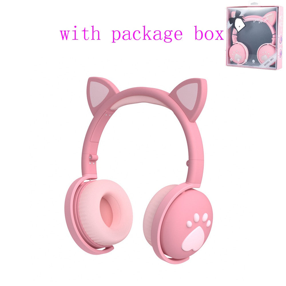 Pink Bluetooth cat ear headphones with soft ear cushions and package box for stylish music lovers
