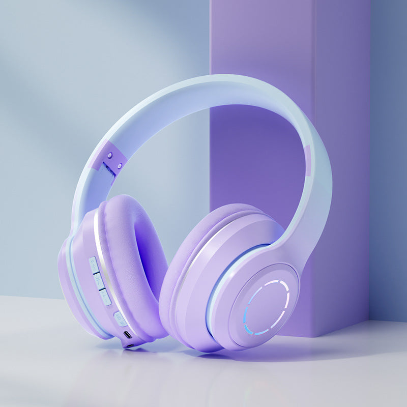 Gradient Bluetooth headphones in soft lavender colors with touch controls and modern design