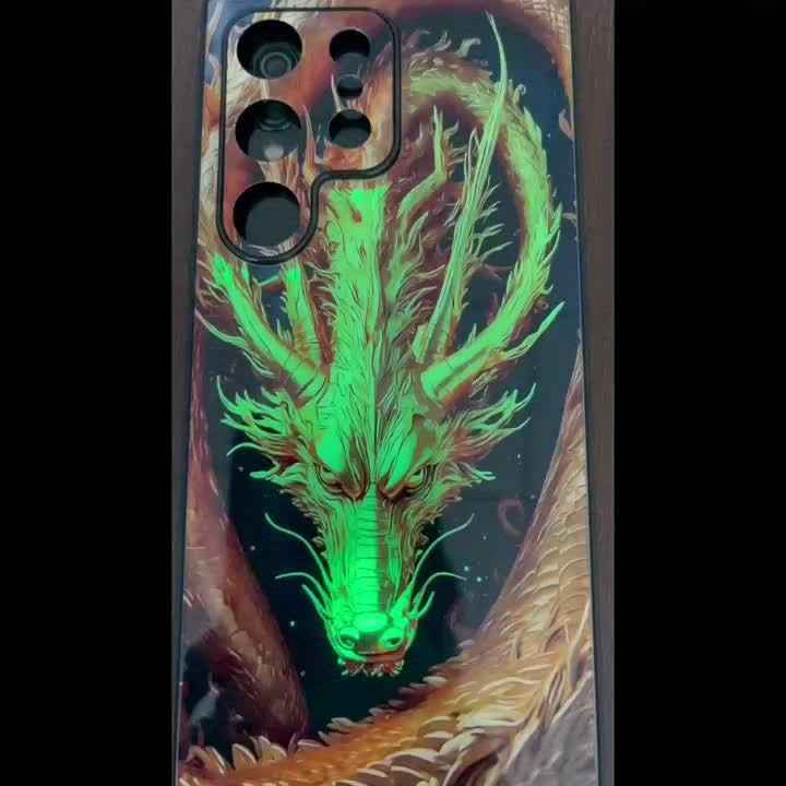 LED dragon phone case featuring a glowing green dragon design on a sleek black background