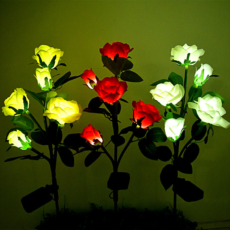 LED solar rose garden lamp set with vibrant red and yellow roses for outdoor decoration