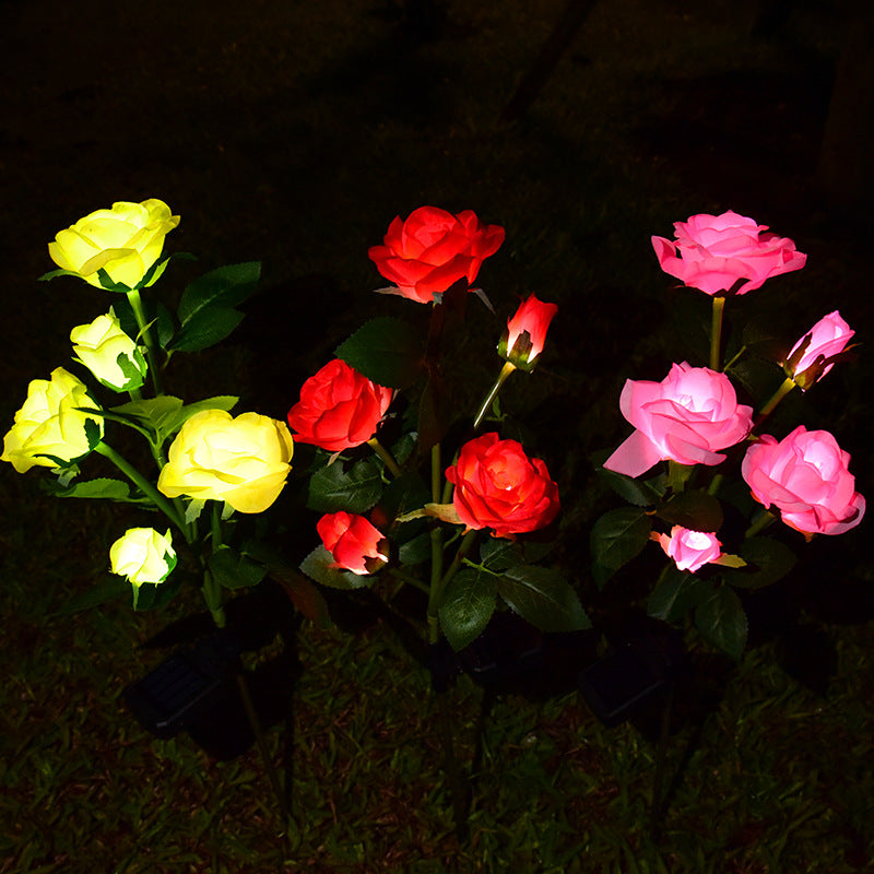 Colorful LED solar rose garden lamp set with yellow, red, and pink roses for outdoor decoration