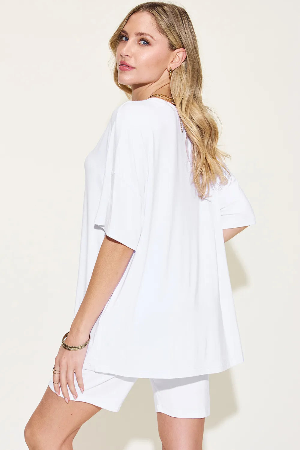 Casual white trendy lounge wear for women featuring a relaxed oversized tee and shorts