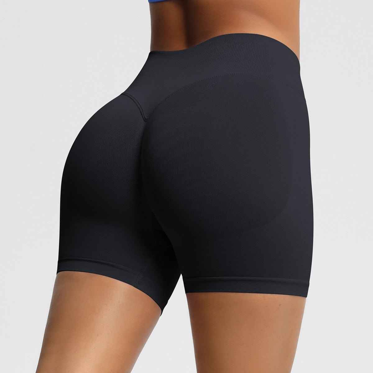 Black women's seamless fitness shorts designed for comfort and flexibility during workouts