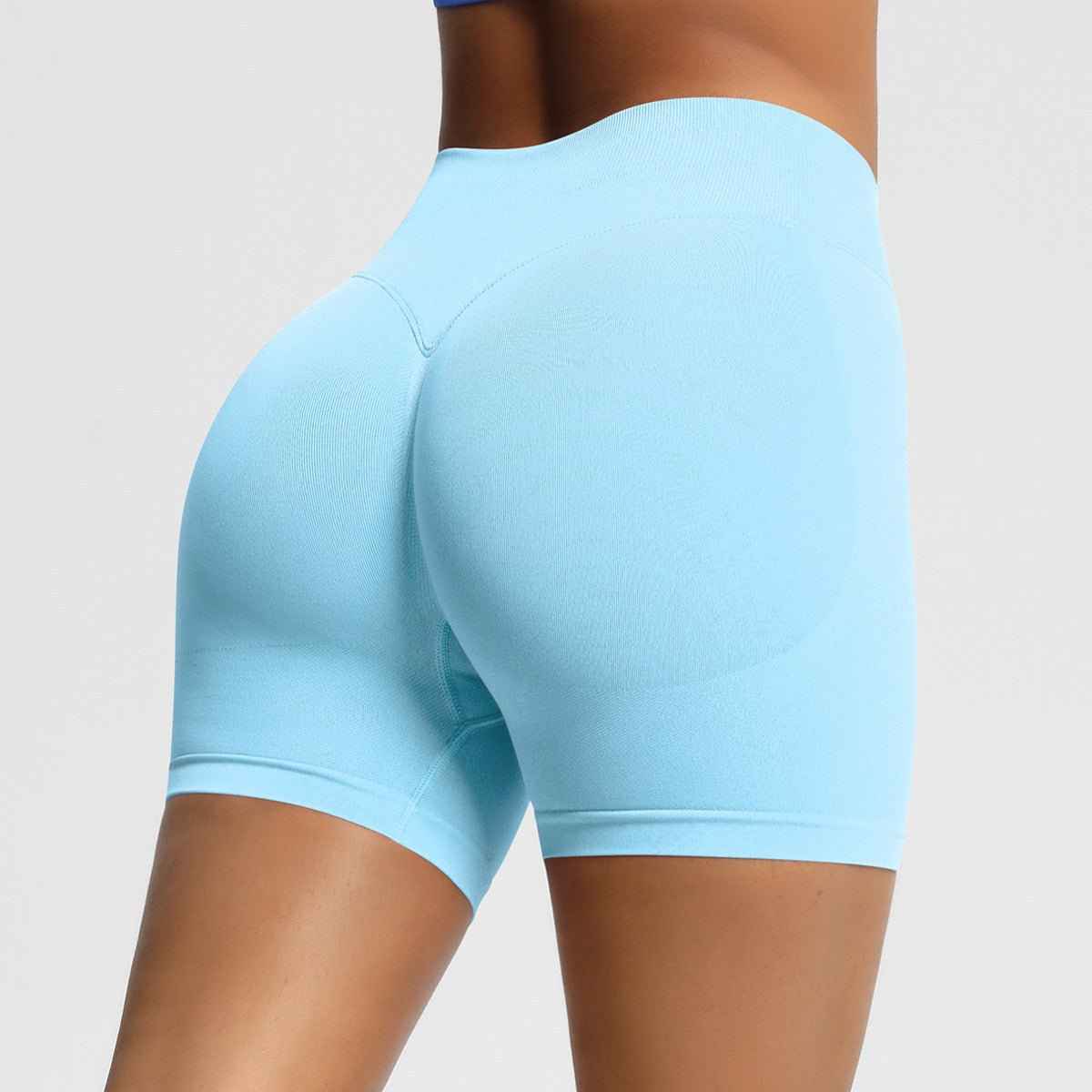 Light blue women's seamless fitness shorts designed for comfort during workouts