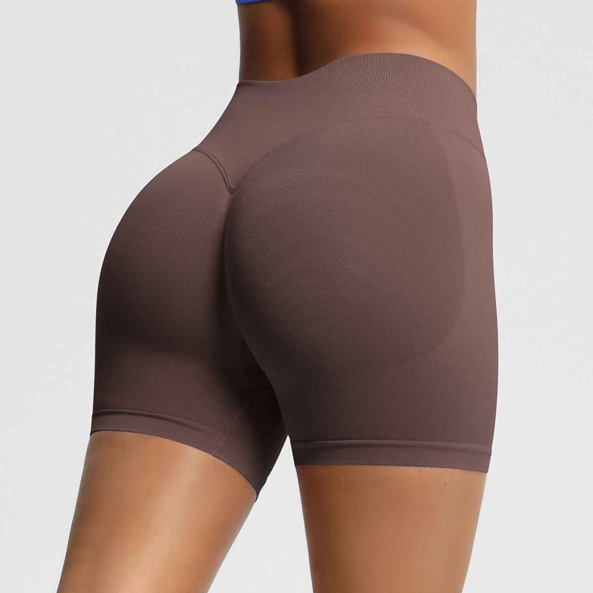 Women's seamless fitness shorts in brown for comfortable workouts and active lifestyle