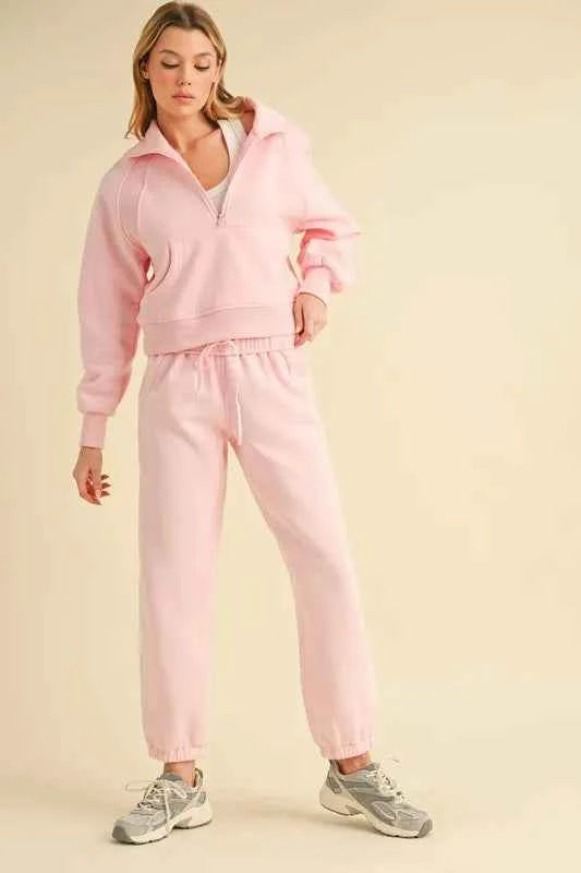 Aemi+Co elastic waist joggers in soft pink paired with a matching hoodie for comfortable casual wear