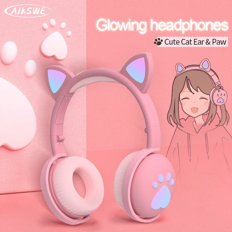 Cute pink Bluetooth cat ear headphones with glowing features and paw design for fans