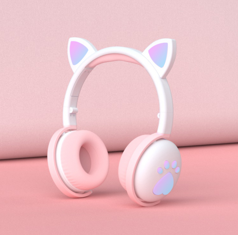Bluetooth cat ear headphones in pastel pink with cute cat ear design and soft ear pads