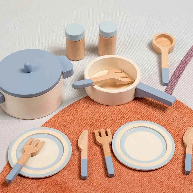 Wooden role-play chef set for kids featuring pots, utensils, and plates for imaginative cooking fun