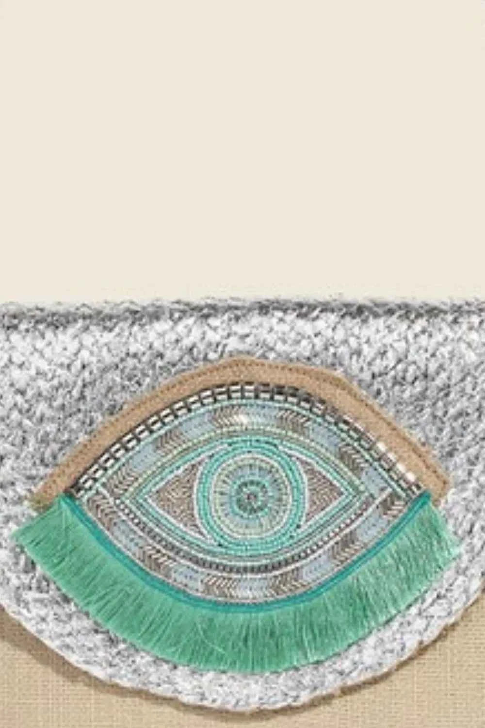 Trendsi eye pattern clutch purse featuring intricate embroidery and colorful fringe detail