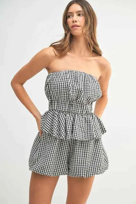 Trendy gingham tube top and shorts set in black and white with a peplum design for summer style