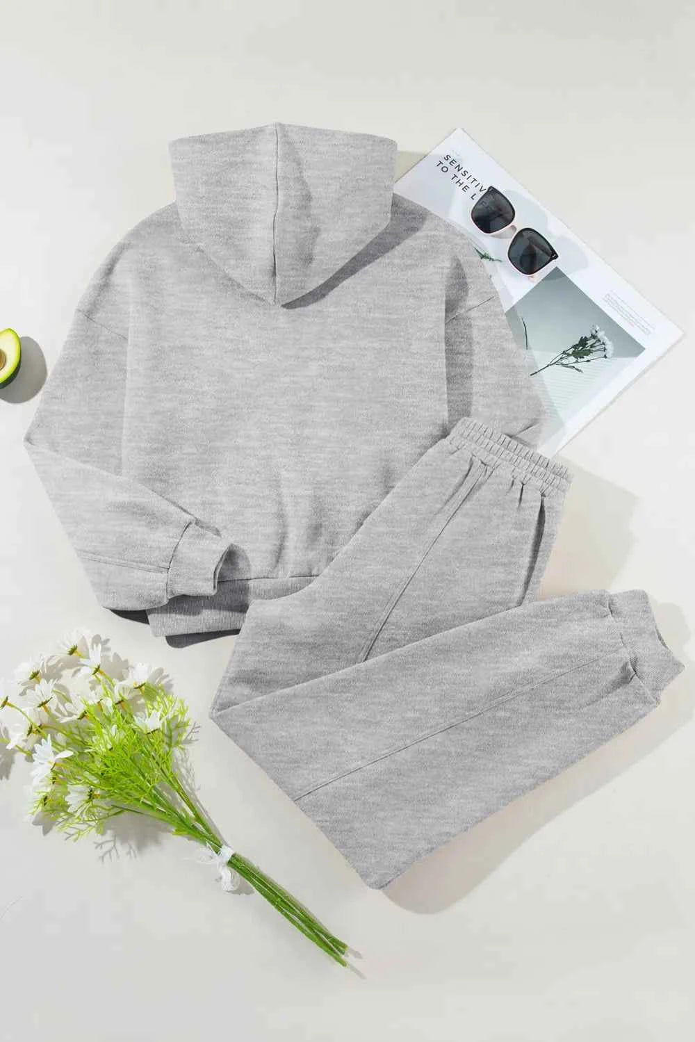 Trendsi grey tracksuit for women featuring a cozy hoodie and comfortable jogger pants