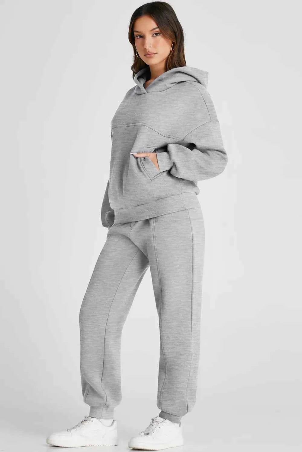 Comfortable grey tracksuit for women featuring a hoodie and jogger pants perfect for casual wear