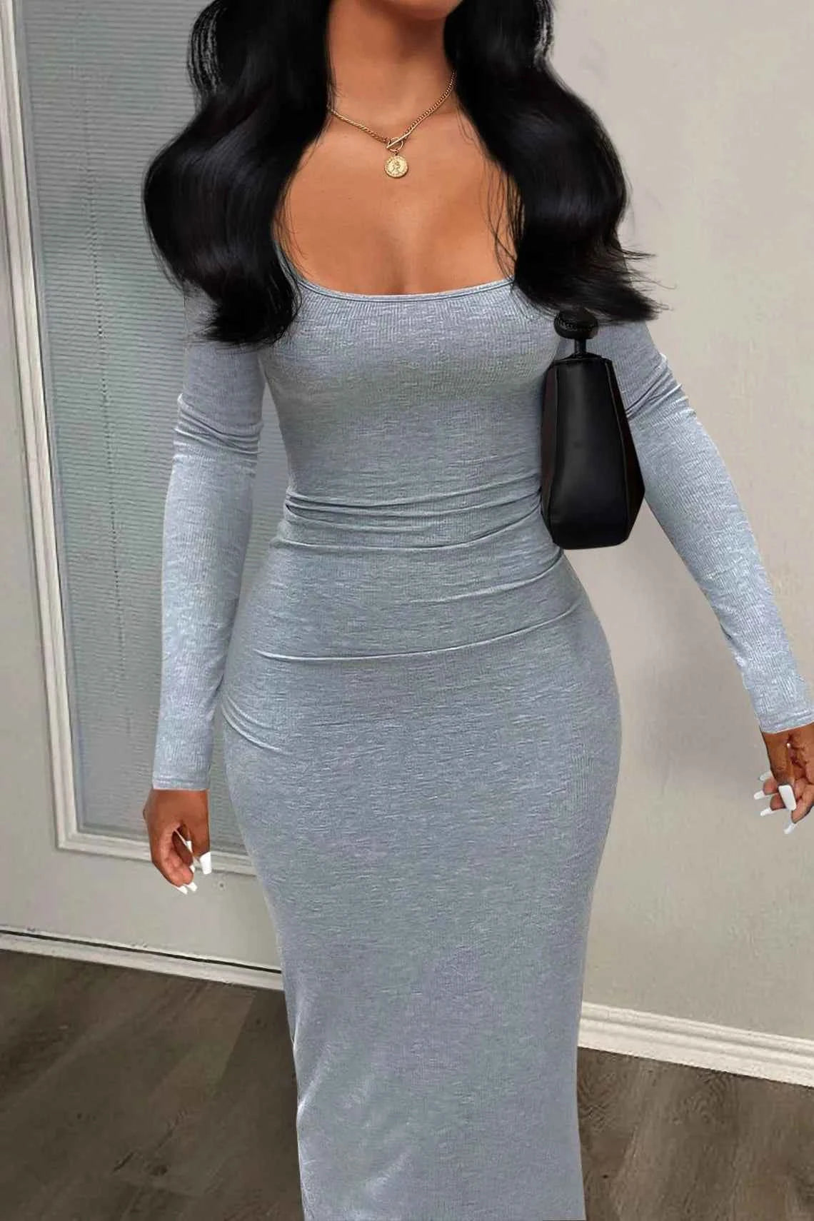 Grey long sleeve sheath dress with a form-fitting silhouette and stylish square neckline