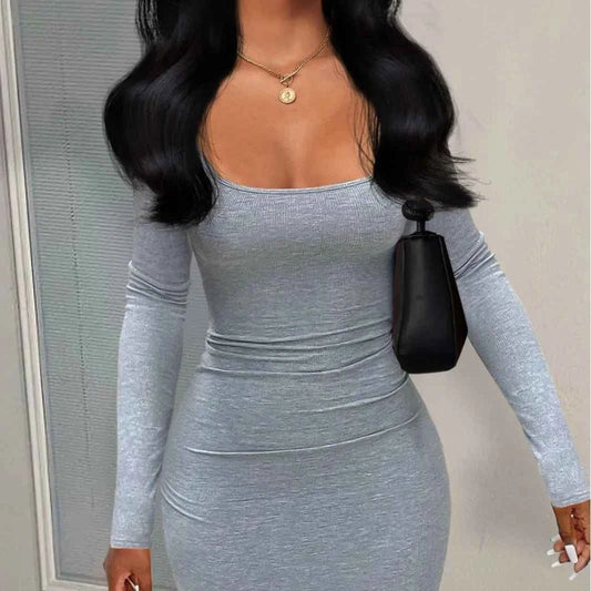 Gray long sleeve sheath dress with a fitted silhouette perfect for casual or formal occasions