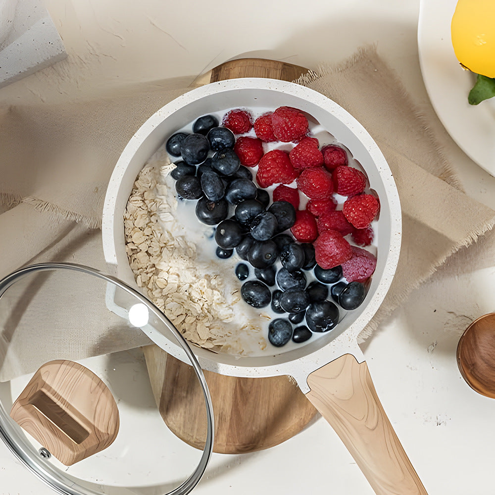 Medical stone non-stick cookware set showcasing oatmeal and fresh berries for healthy cooking