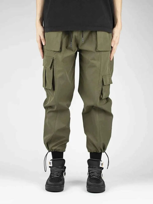 Trendsi men's drawstring cargo pants in olive green with multiple pockets and tapered cuffs