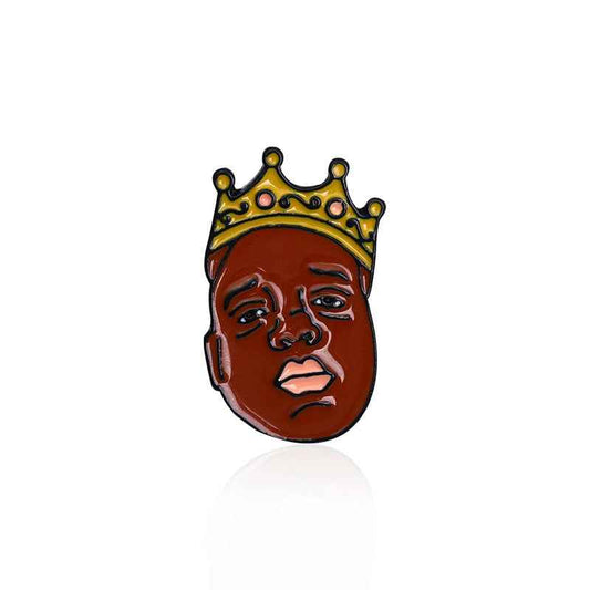 Notorious B.I.G. enamel pin featuring a portrait with a crown, perfect for music fans and collectors