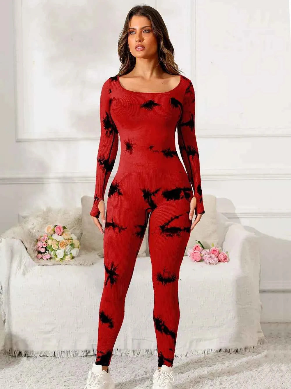Stylish red and black premium fitness jumpsuit for workouts with long sleeves and a flattering fit