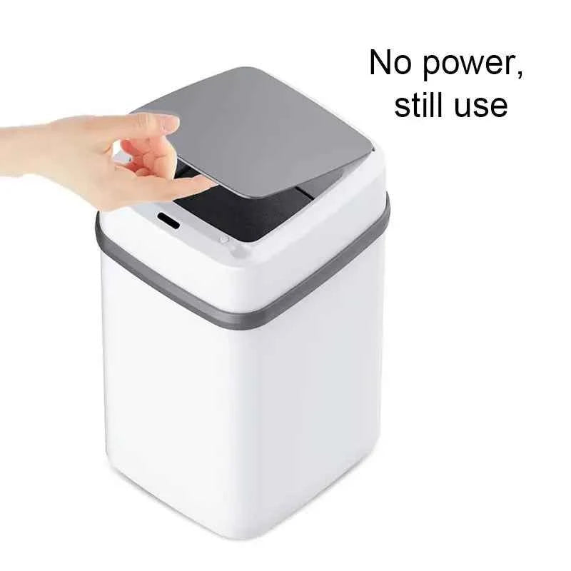 White smart kitchen trash can with a hand opening the lid, designed for easy use even without power
