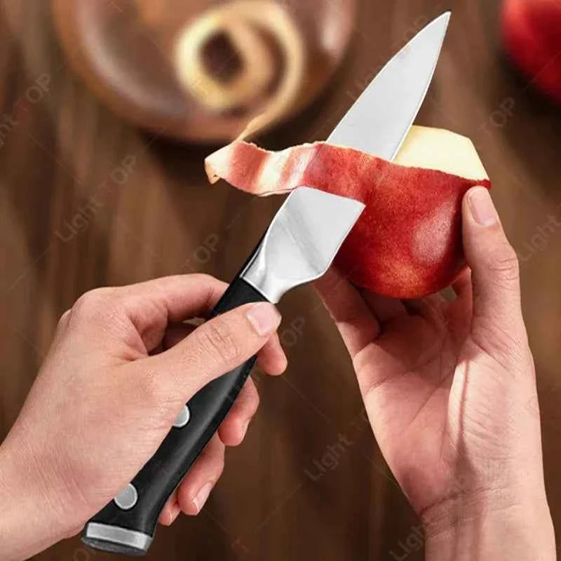 My Store Stainless Steel Paring Knife in action, peeling an apple with precision and control