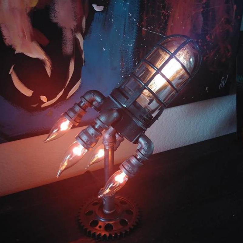 Steampunk rocket lamp decor with glowing lights and industrial design, perfect for unique home accents