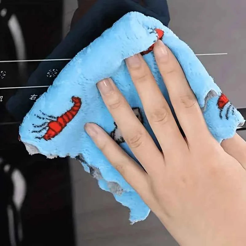 Colorful water-absorbent dish cloth being used for cleaning surfaces efficiently