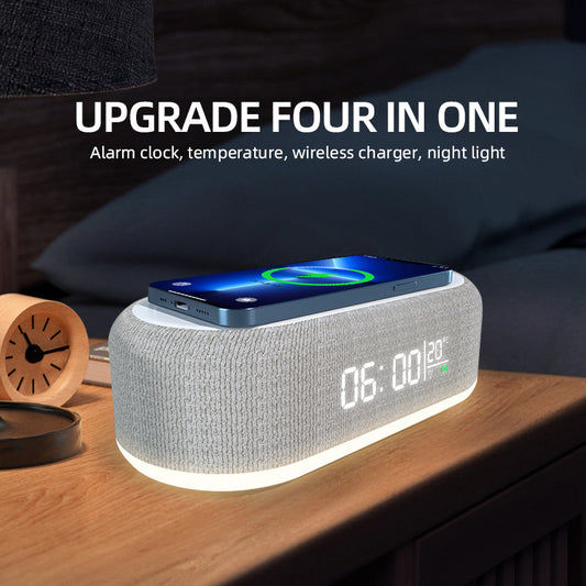 Wireless charging dock with alarm clock featuring temperature display and night light function