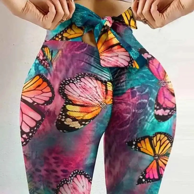 Colorful women's bowknot yoga pants with butterfly prints, perfect for stylish workouts