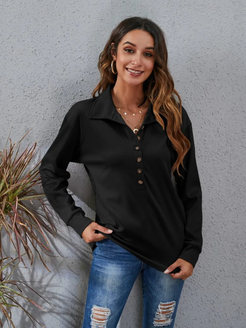 Stylish women's classic blouse in black with a collar and button detailing for casual elegance