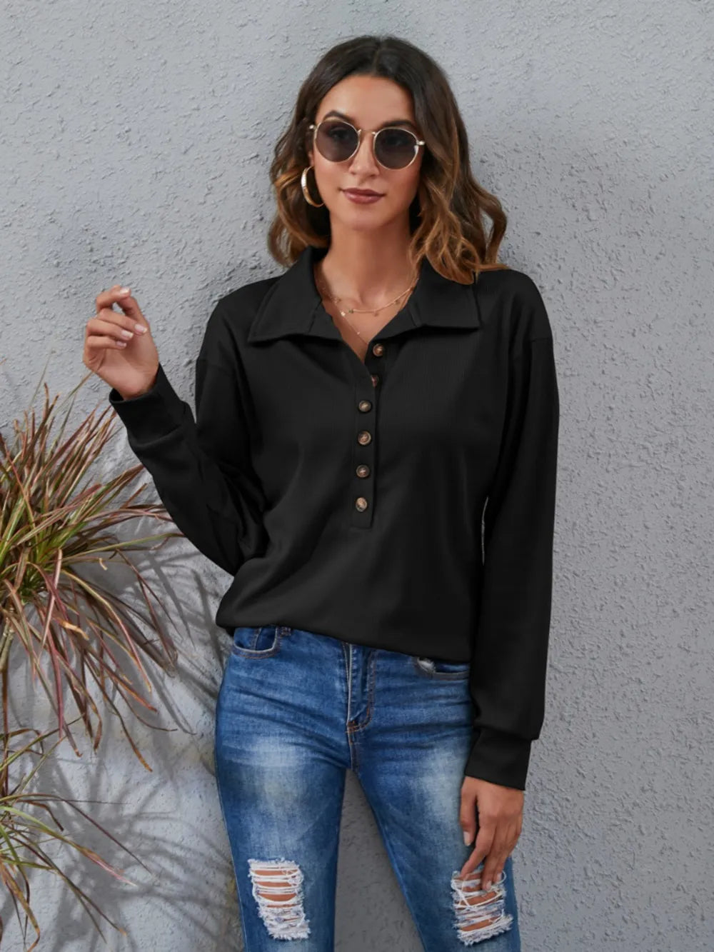 Women's classic blouse in black with button-down front and long sleeves for stylish casual wear
