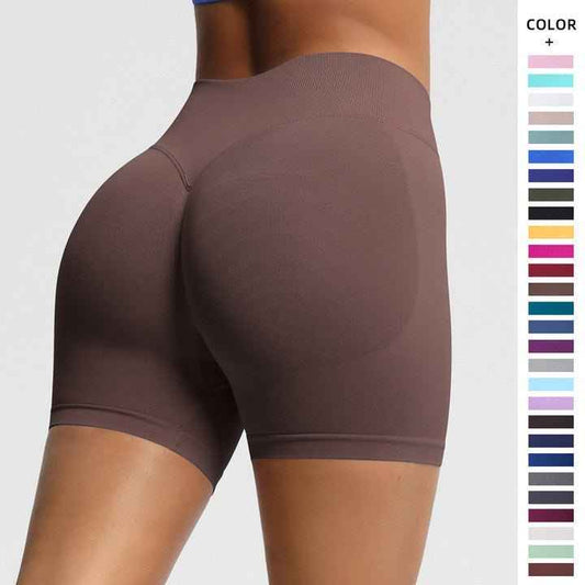 Women's seamless fitness shorts in brown with a flattering fit for comfortable workouts