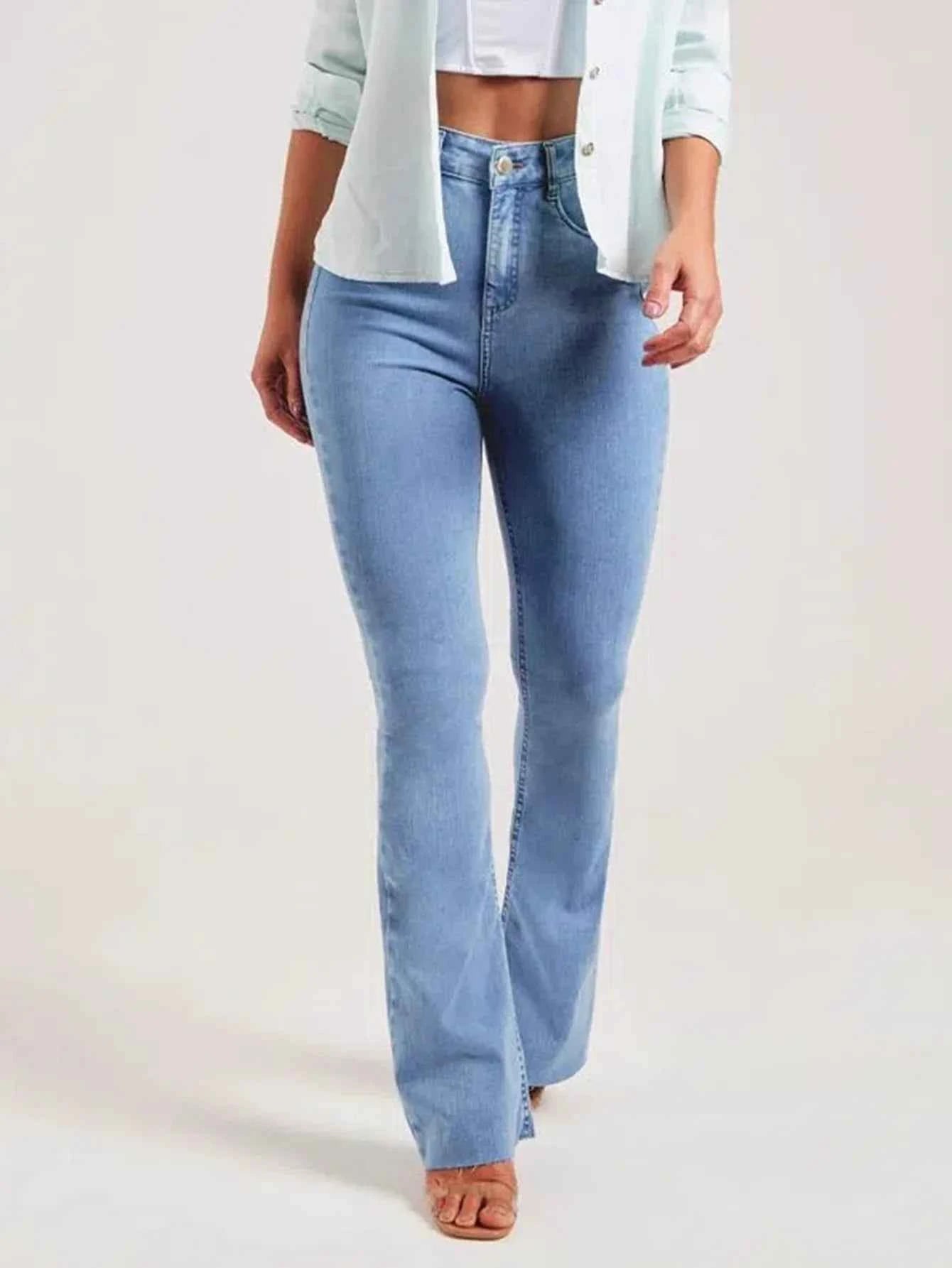 Stylish women's vintage denim pants in light blue with a flared leg design for a trendy look