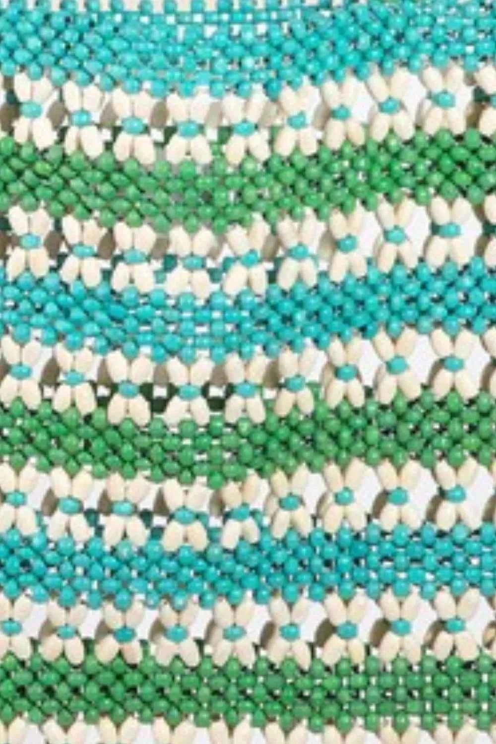 Colorful wooden beaded tote bag featuring green and turquoise bead patterns for stylish summer looks