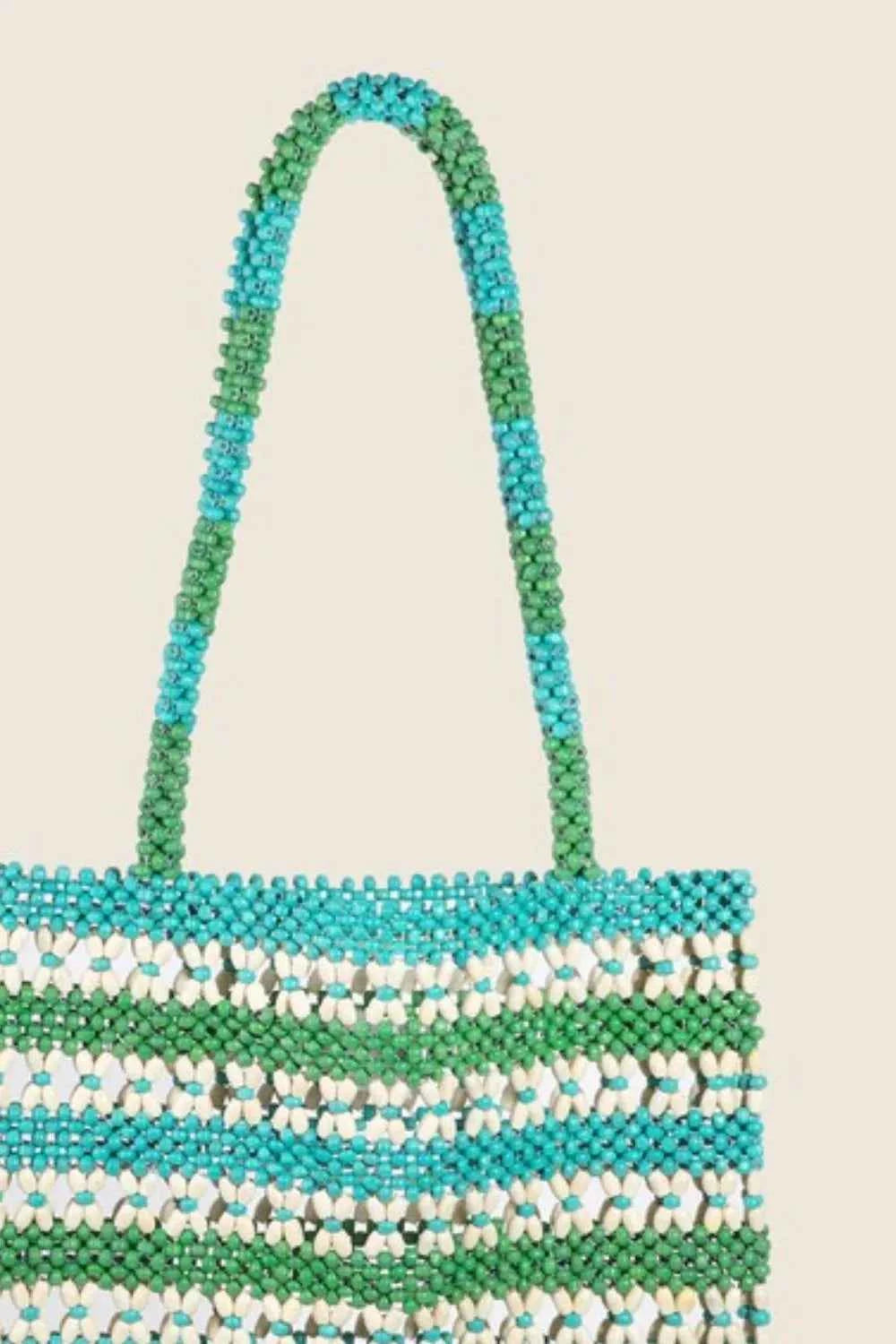 Colorful wooden beaded tote bag with a unique design and sturdy handles for stylish outings
